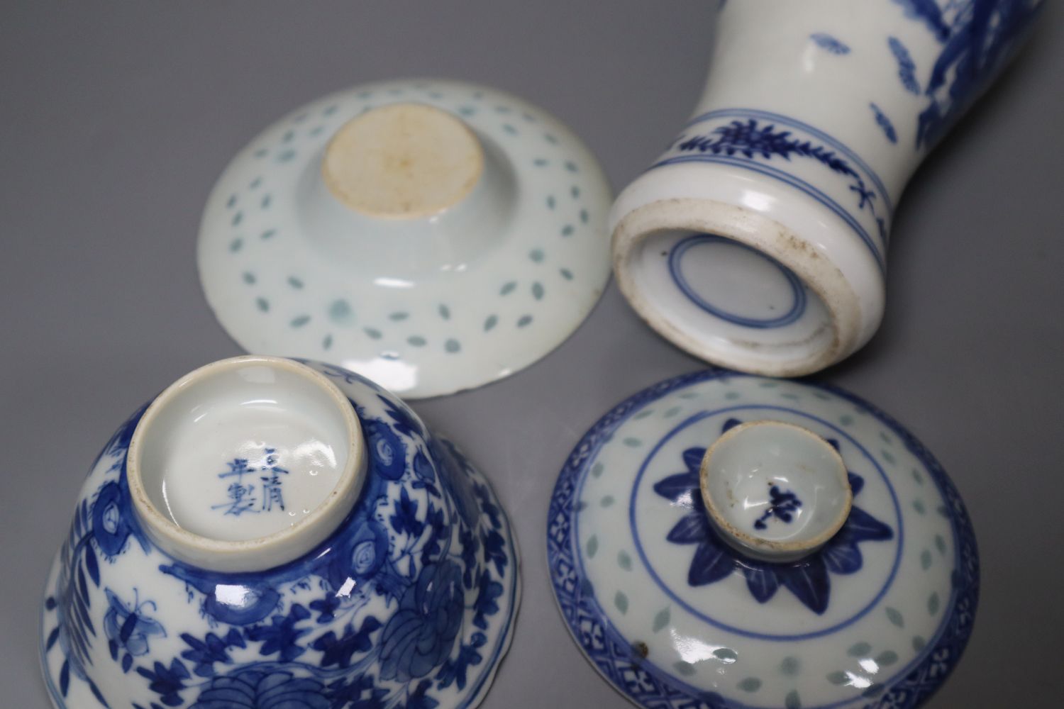 A Chinese blue and white baluster vase, 17cm, three Chinese bowls and four stands